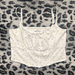 Hollister White Cami Top With Micro Ruffles and Blue Floral Print